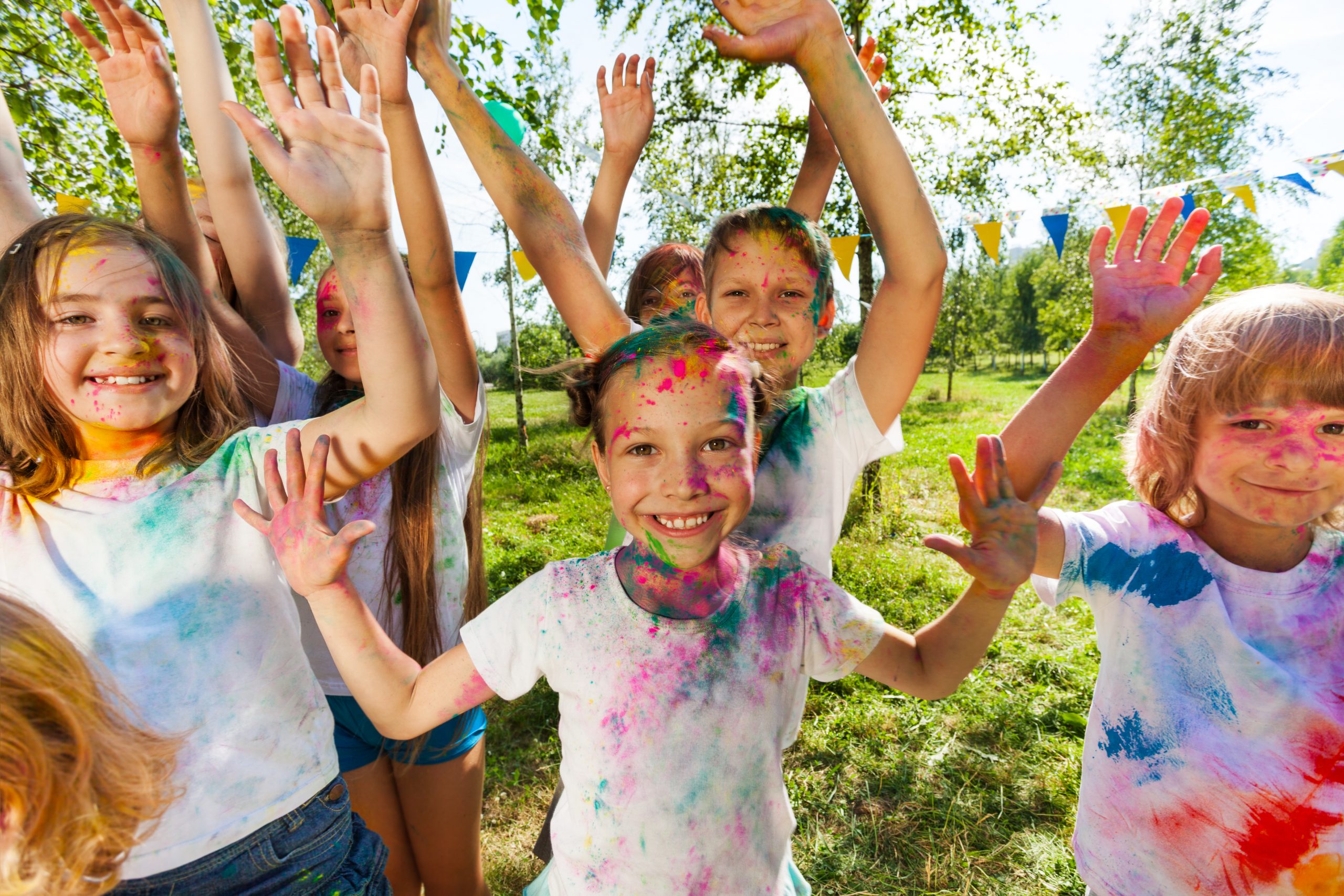 Portrait,Of,Bright,Kids,Smeared,In,Colored,Powder